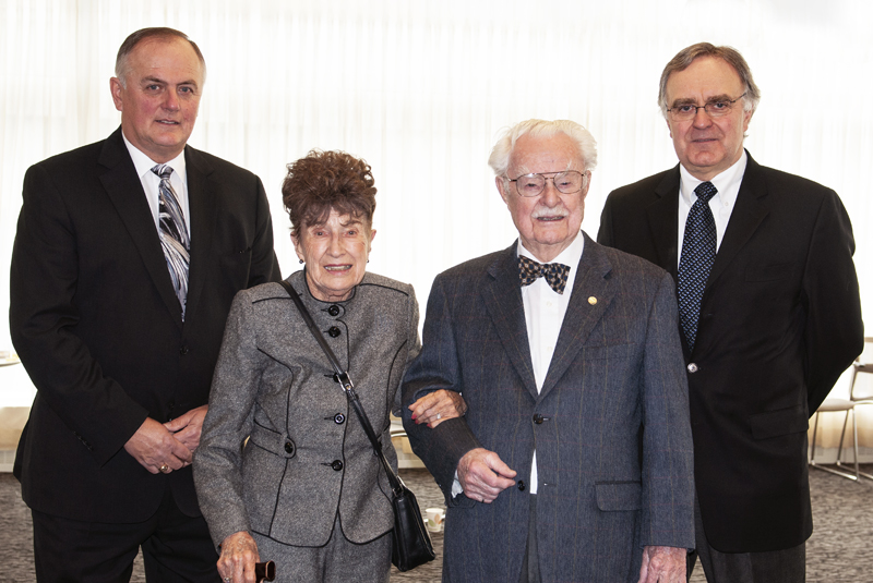 Doris and George Govier are flanked by former ERCB board members