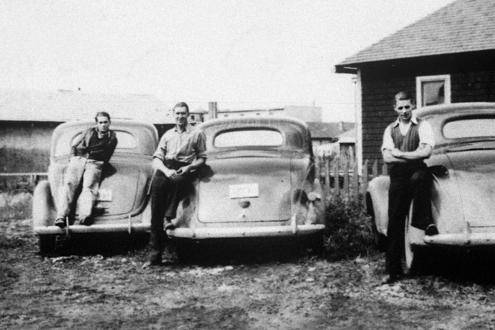 First inspectors posing with cars