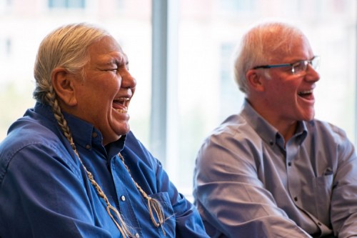 Blackfoot elder Dr. Reg Crow Shoe and President & Chief Executive Officer Jim Ellis