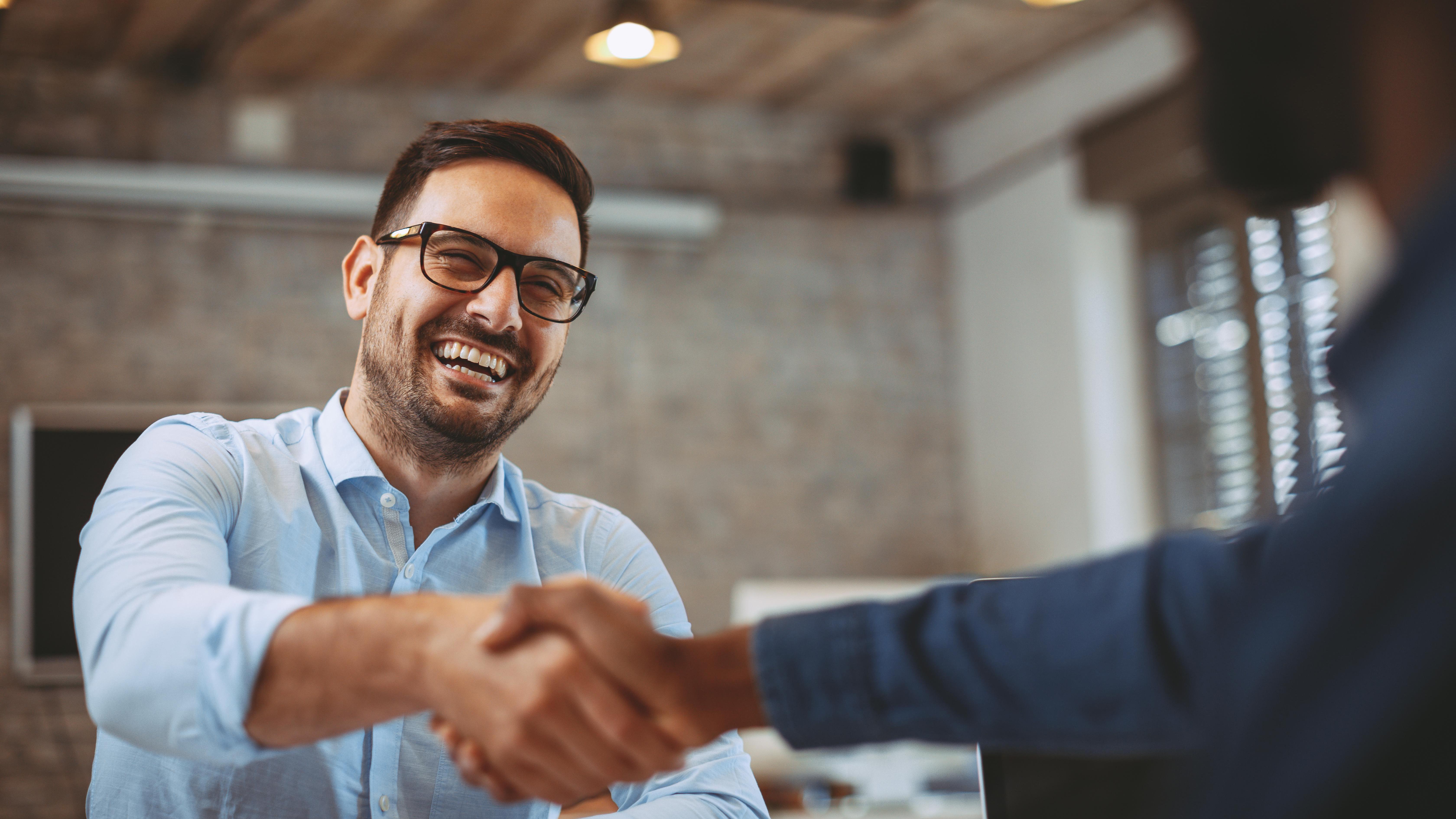 man shaking a hand