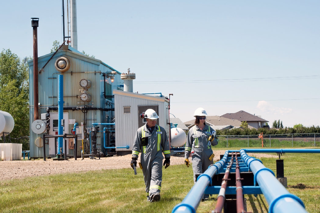 Alberta Energy Regulator employees checking the pipeline