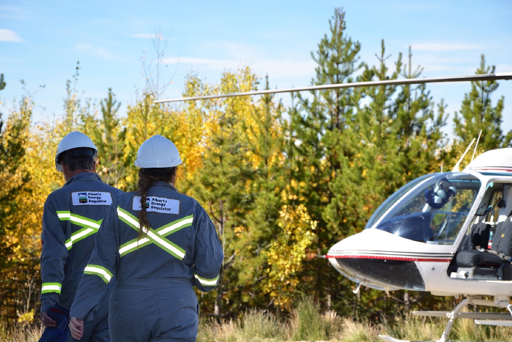 Alberta Energy Regulator inspectors and helicopter 
