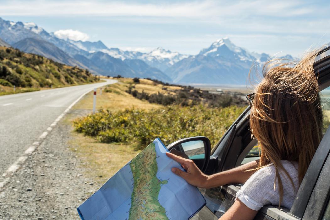 Women on the go looking at the map