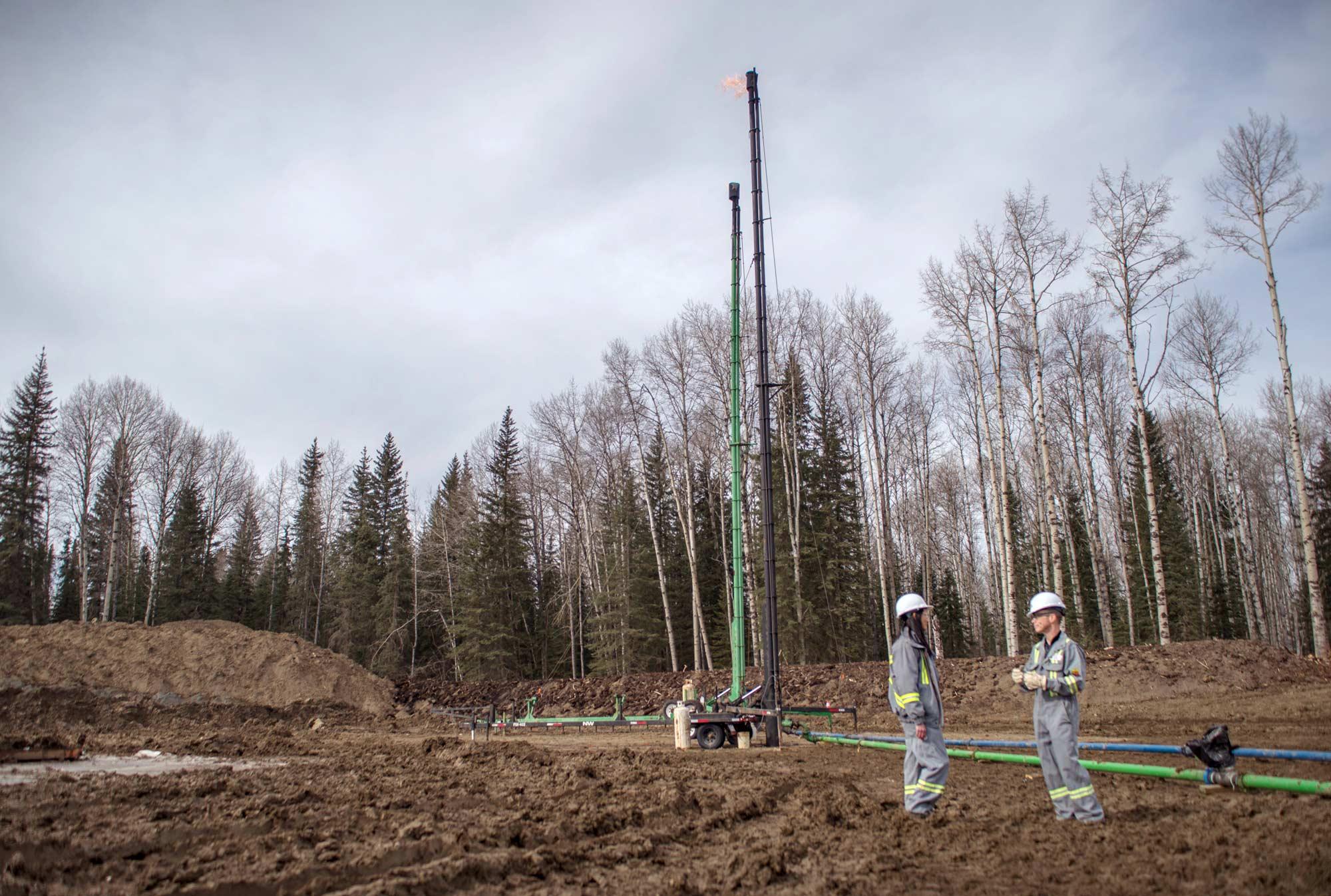 AER staff at the site of the last of eight wells the AER sampled